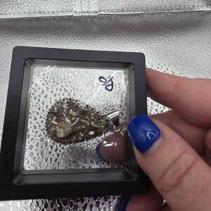 natural pyrite gemstone pendant set in a 925 sterling silver frame